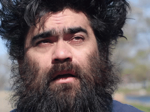 Bearded Man Sad Look at Camera