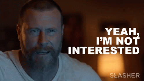 Bearded Man Saying Yeah I'm Not Interested in Dark Room