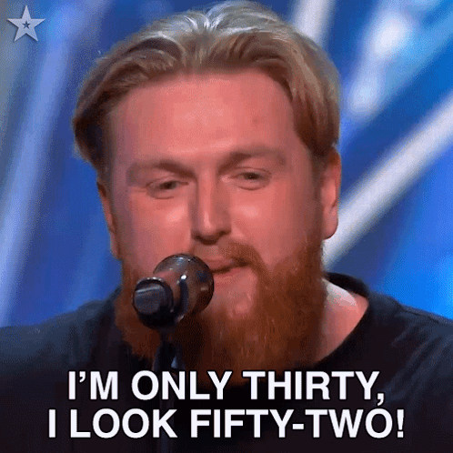 Bearded Man Singing Into Microphone I'm Only Thirty