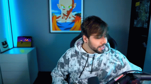 Bearded Man Sitting At Microphone GIF