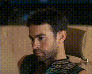 Bearded Man Sitting in Chair