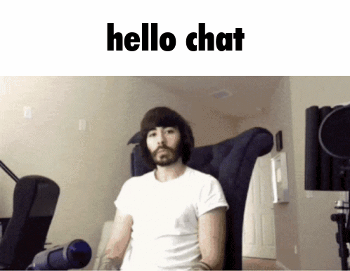 Bearded Man Sitting in Chair Saying Hello Chat