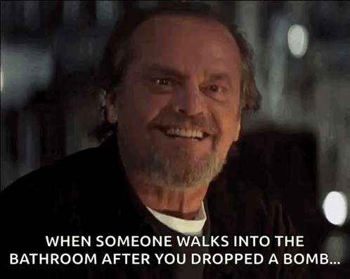 Bearded Man Smiling After Bathroom Incident