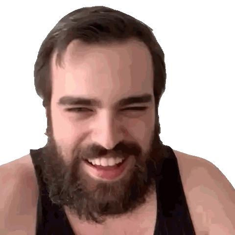 Bearded Man Smiling in Black Tank Top