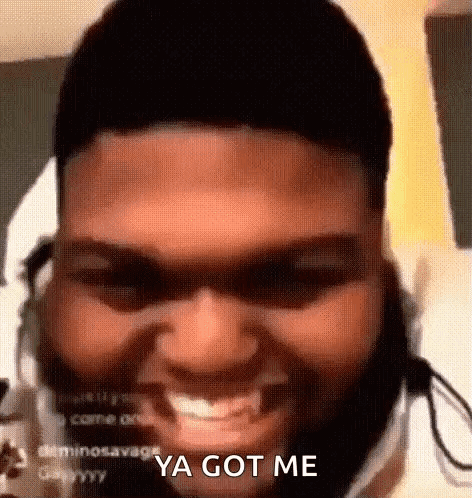 Bearded Man Smiling in Headphones Making Funny Face