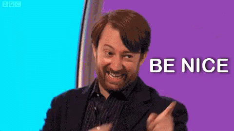 Bearded Man Smiling Pointing Be Nice