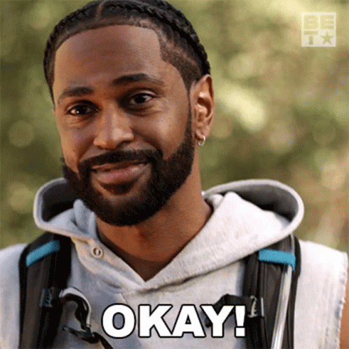 Bearded Man Smiling Saying Okay