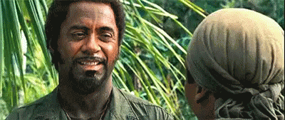 Bearded Man Smiling Talking In Jungle GIF
