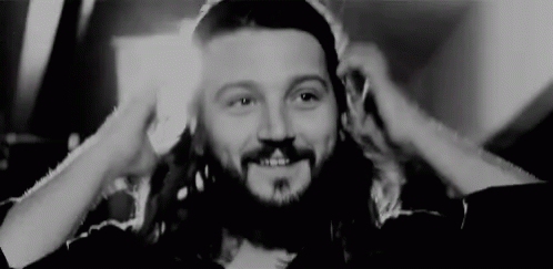 Bearded Man Smiling with Headphones