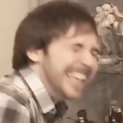 Bearded Man Smiling With Tongue Out