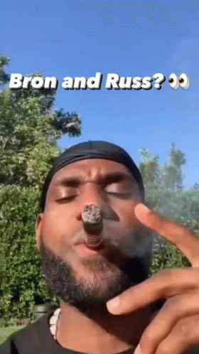 Bearded Man Smoking Cigar With Bron And Russ GIF