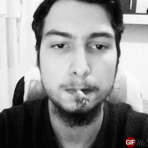 Bearded Man Smoking Cigarette Black and White