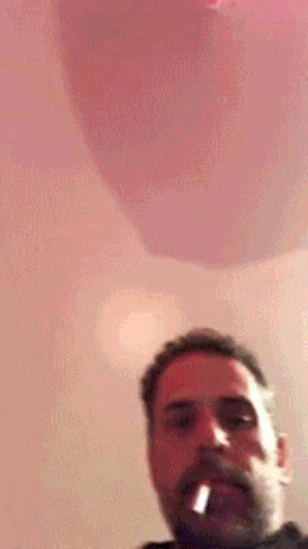 Bearded Man Smoking Cigarette Pink Balloon