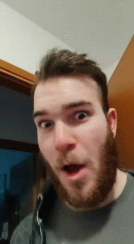 Bearded Man Surprised At Door GIF