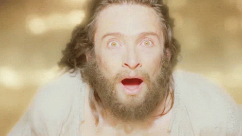 Bearded Man Surprised with Open Mouth