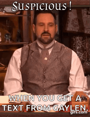 Bearded Man Suspicious of Text From Gaylen