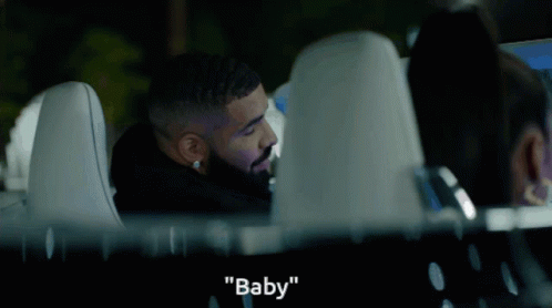 Bearded Man Talking To Woman In Car Saying Baby GIF
