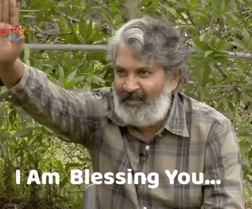 Bearded Man Waving Saying I Am Blessing You GIF