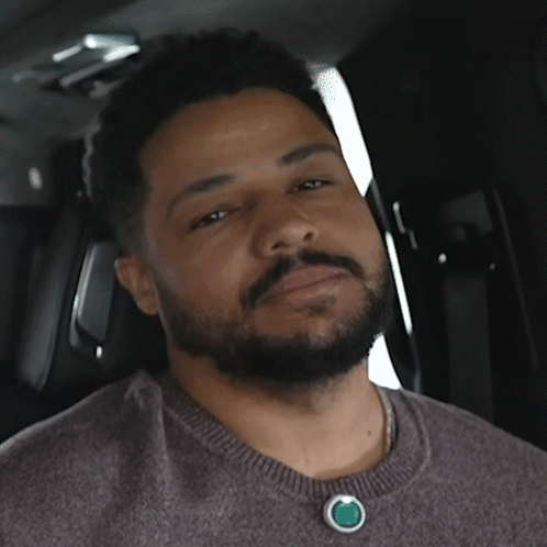 Bearded Man Wearing Green Stone Necklace GIF