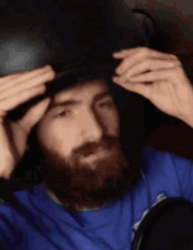 Bearded Man Wearing Hat Looking In Mirror GIF