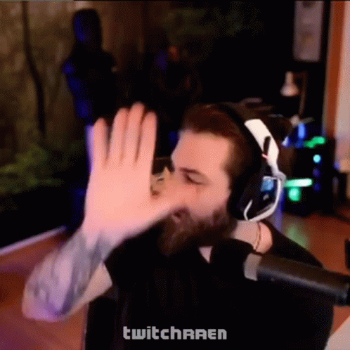 Bearded Man Wearing Headphones Giving High Five