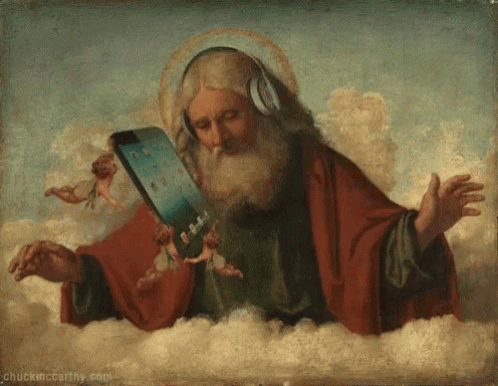 Bearded Man Wearing Headphones Holding Tablet