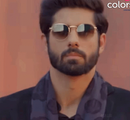 Bearded Man Wearing Sunglasses and Scarf