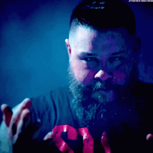 Bearded Man Wearing The Next Thing Shirt