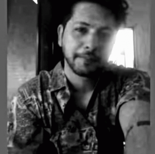 Bearded Man with Arm Tattoo