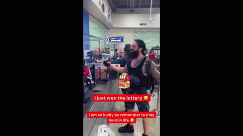Bearded Man With Arm Tattoo Smiling
