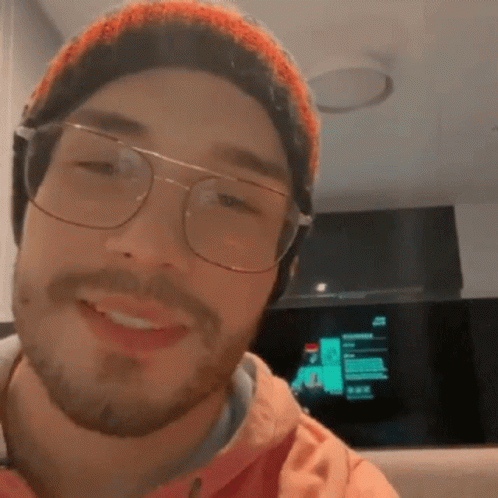Bearded Man With Glasses And Beanie Smiling GIF