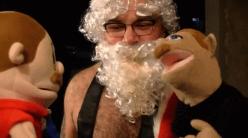 Bearded Man With Glasses And Stuffed Animals GIF
