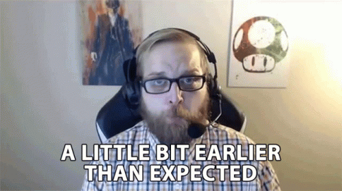 Bearded Man with Glasses, Headphones, and Microphone
