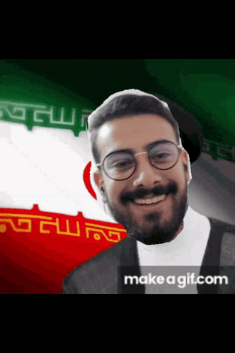 Bearded Man with Glasses Smiling by Flag