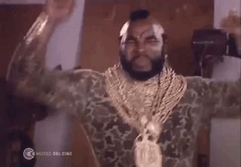 Bearded Man With Gold Chains And Jewelry GIF