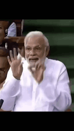 Bearded Man With Hands Up Making Funny Face