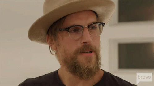 Bearded Man with Hat and Glasses on Bravo