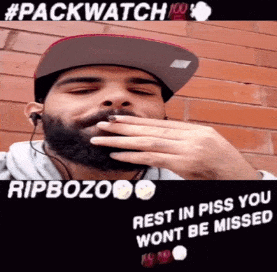 Bearded Man With Hat Earbuds Says Rip Bozo GIF