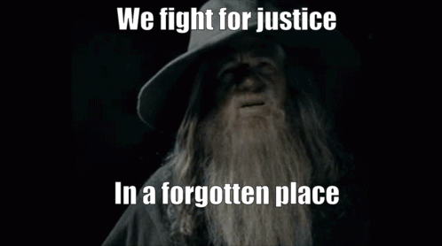 Bearded Man with Hat We Fight for Justice in a Forgotten Place