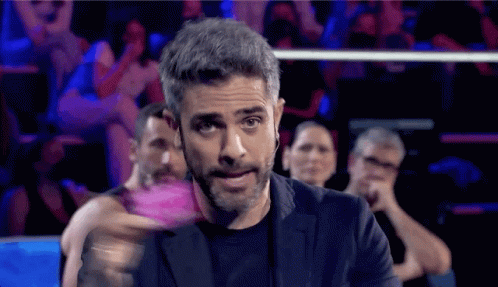 Bearded Man With Head Microphone Before Crowd