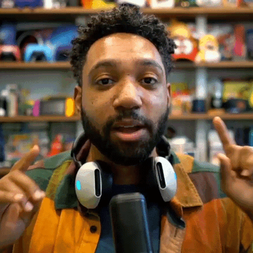 Bearded Man With Headphones And Colorful Jacket GIF