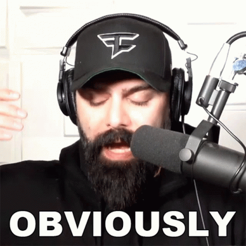 Bearded Man With Headphones and Hat Says Obviously