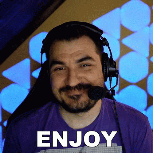 Bearded Man With Headphones And Microphone Saying Enjoy GIF