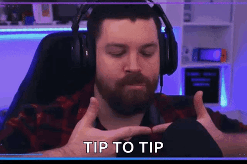 Bearded Man With Headphones Making Hand Gesture GIF