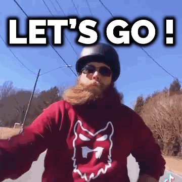 Bearded Man With Helmet and Sunglasses Says Let's Go