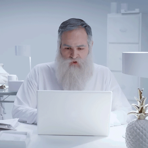 Bearded Man With Laptop Saying Ay Dios Mio