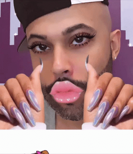 Bearded Man With Long Nails and Fake Mouth