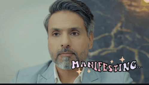 Bearded Man With Manifesting Written on Face