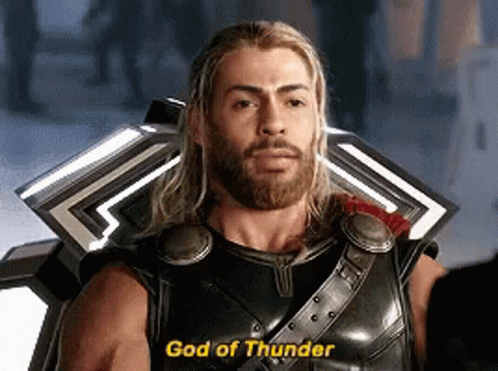 Bearded Man With Shield Saying God of Thunder