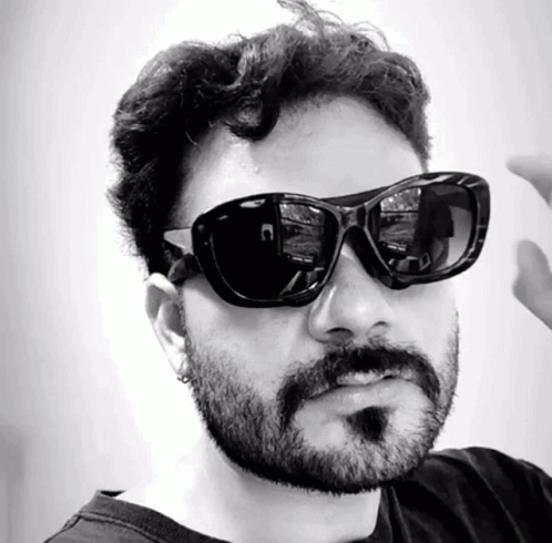 Bearded Man with Sunglasses and C